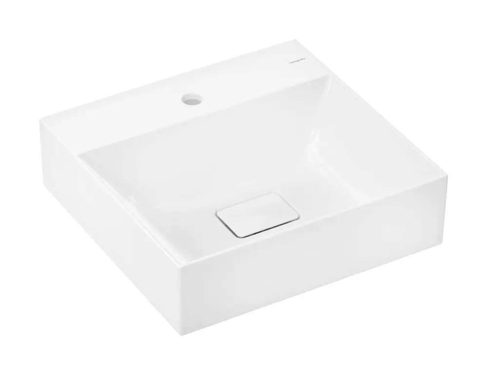 Weißes Handwaschbecken mit quadratischer Form und zentralem Hahnloch, ohne Überlauf. Marke: Hansgrohe. Schlichte, moderne Designlinie.